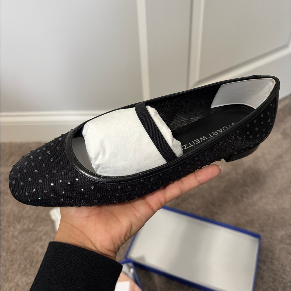 Stuart Weitzman Black Flats with Sleek Design